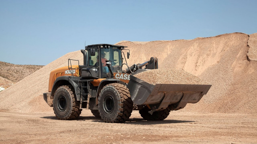 wheel loader carrying sand